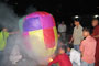 Lighting a lamp during the celebration. 